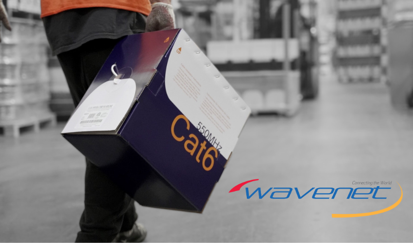 wavenet employee carrying box of cat6 cables